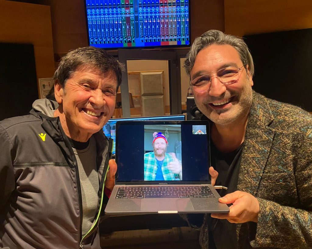 Mousse T, Gianni Morandi e nello schermo del PC Jovanotti / Foto: Radio Norba