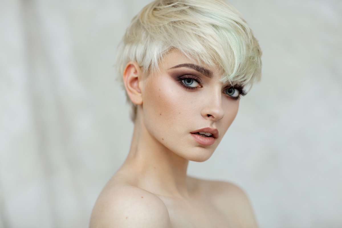 Portrait of blond beauty with short hair